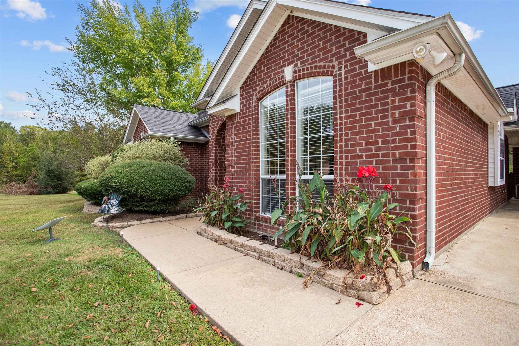 2101 San Antonio Road Crockett, TX 75835 - Photo 31 of 37 a front view of a house with a yard