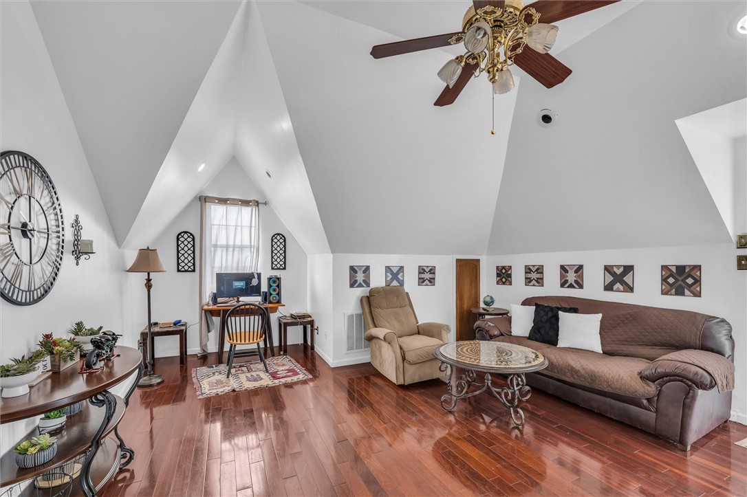 1940 East Highland Road Waxahachie, TX 75167 - Photo 21 of 44 a living room with furniture and wooden floor
