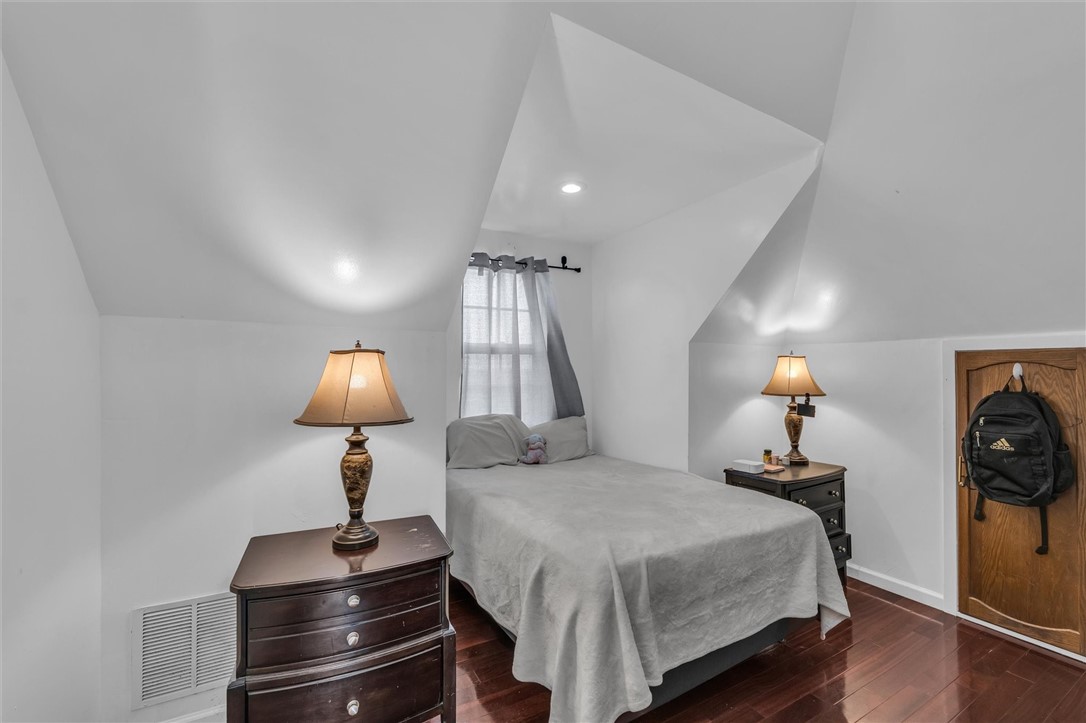 1940 East Highland Road Waxahachie, TX 75167 - Photo 22 of 44 a bedroom with a bed and a lamp