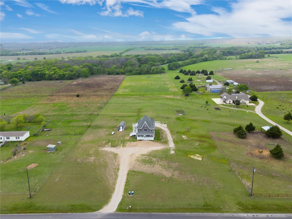 1940 East Highland Road Waxahachie, TX 75167 - Photo 6 of 44 a view of a golf ground with huge green field and covered with side of house