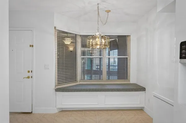 a kitchen that has a sink and a stove