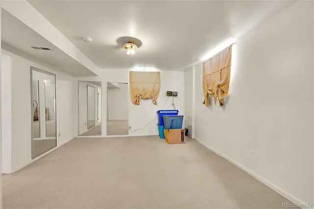 a view of a room with closet area