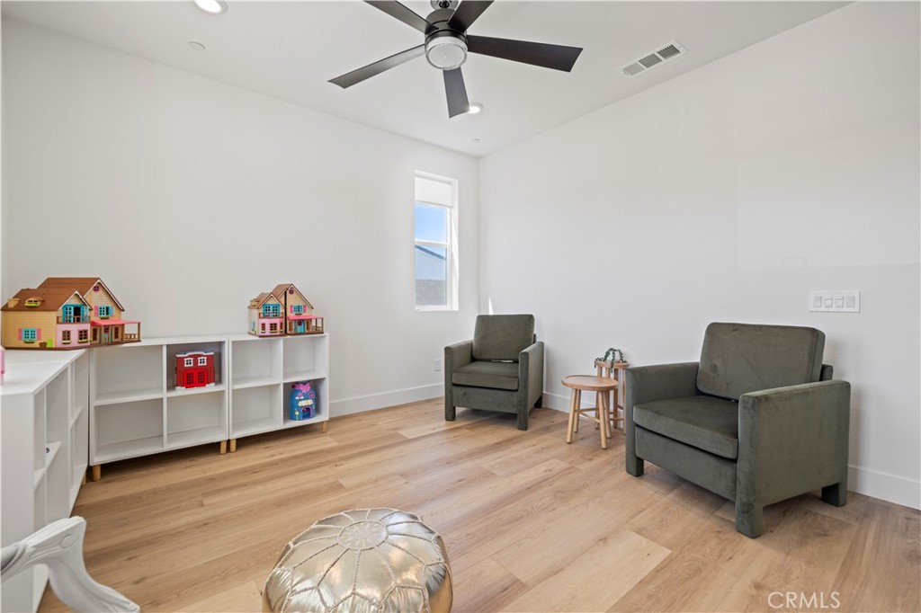 30015 Chestnut Lane Castaic, CA 91384 - Photo 21 of 60 a living room with furniture and a wooden floor