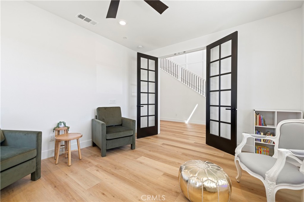 30015 Chestnut Lane Castaic, CA 91384 - Photo 23 of 60 a living room with furniture and wooden floor