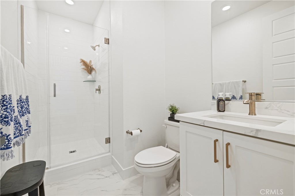 30015 Chestnut Lane Castaic, CA 91384 - Photo 41 of 60 a bathroom with a sink toilet and shower