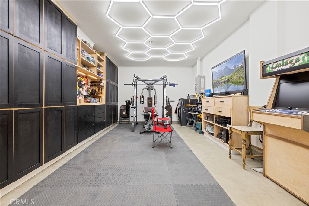 30015 Chestnut Lane Castaic, CA 91384 - Photo 54 of 60 a view of a room with gym equipment