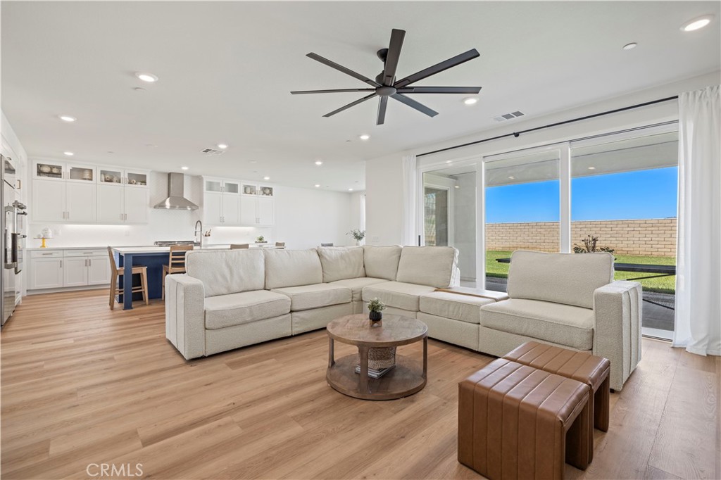 30015 Chestnut Lane Castaic, CA 91384 - Photo 6 of 60 a living room with furniture kitchen view and a wooden floor