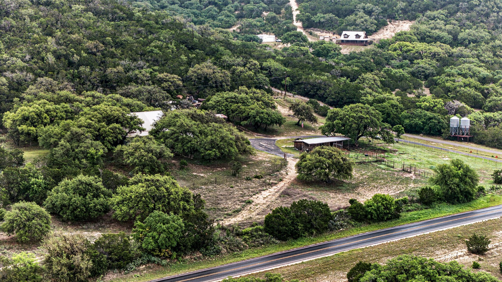 1850 Ranch Road 337 Leakey, TX 78873 - Photo 9 of 50 Aerial view showcasing usable acreage, natural landscape, and peaceful Hill Country setting