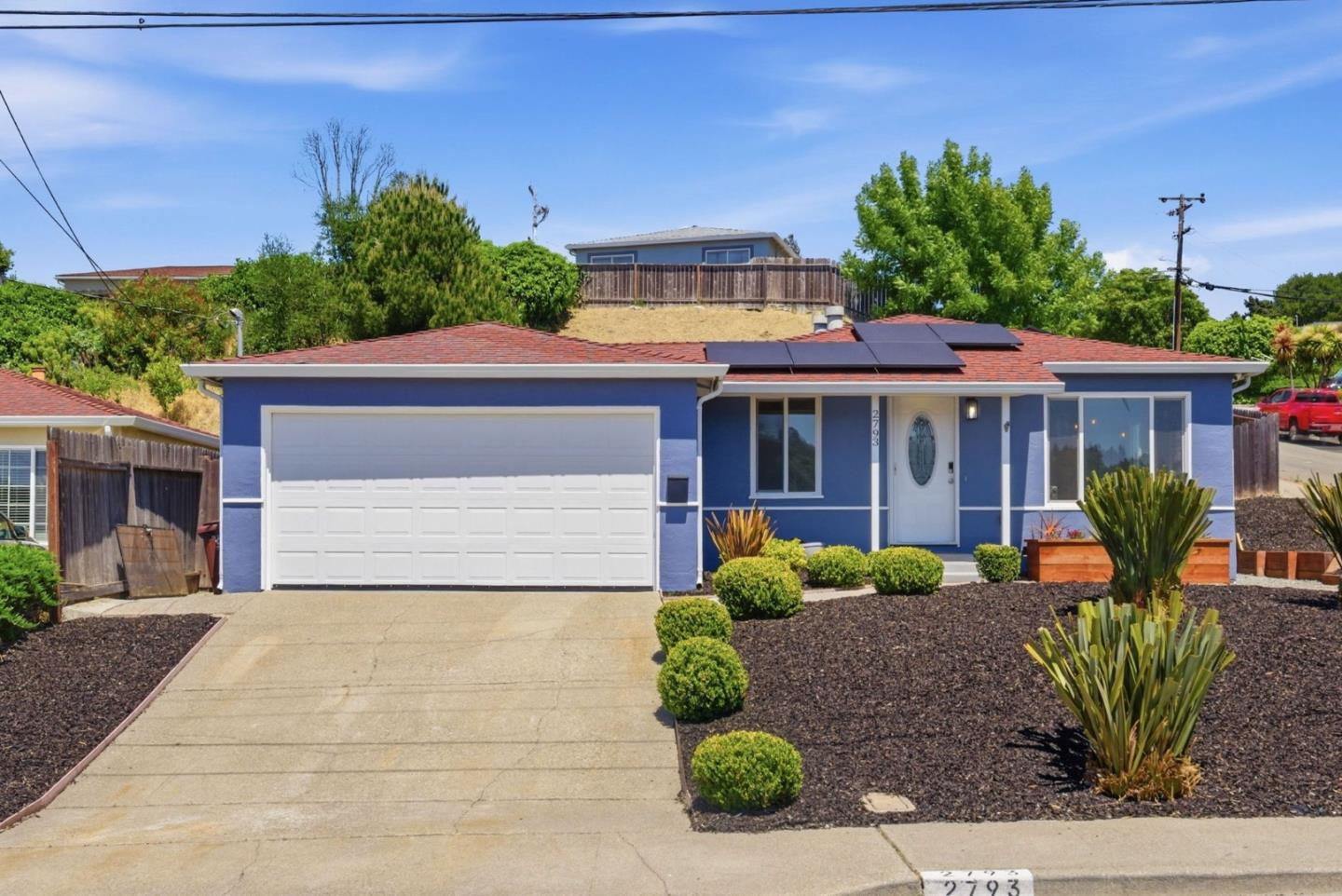 2793 Ruff Court Pinole, CA 94564 - Photo 3 of 53 a front view of a house with garden