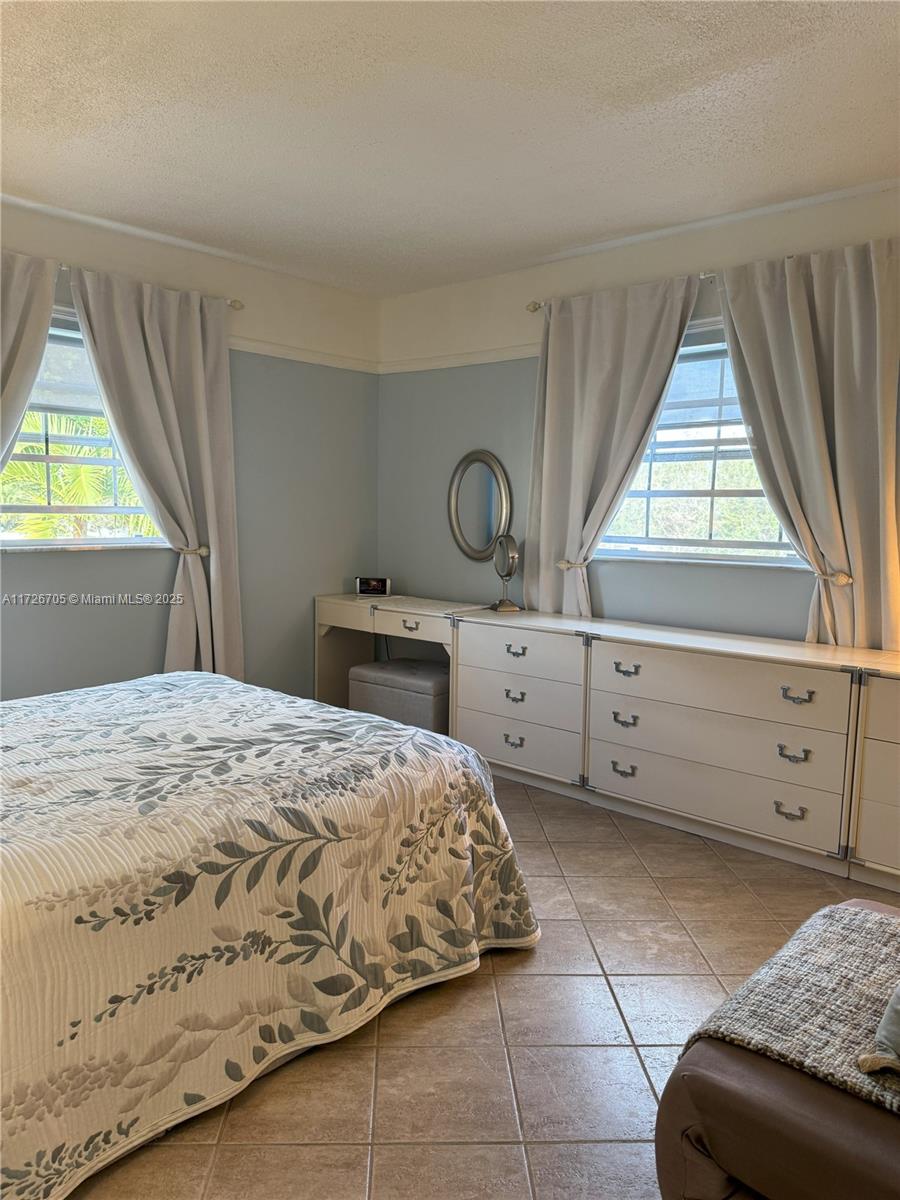 375 Southwest 56th Avenue, Unit 201 Margate, FL 33068 - Photo 6 of 39 Master suite
