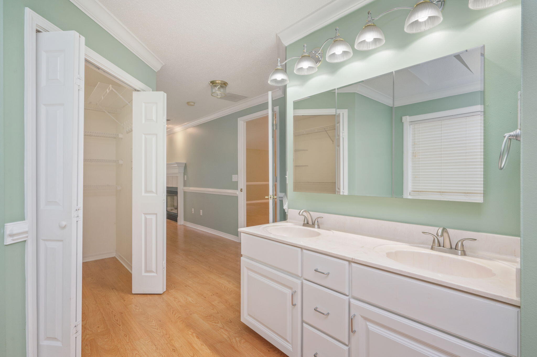734 Riva Ridge Drive Crestview, FL 32539 - Photo 23 of 53 a bathroom with a double vanity sink and a mirror