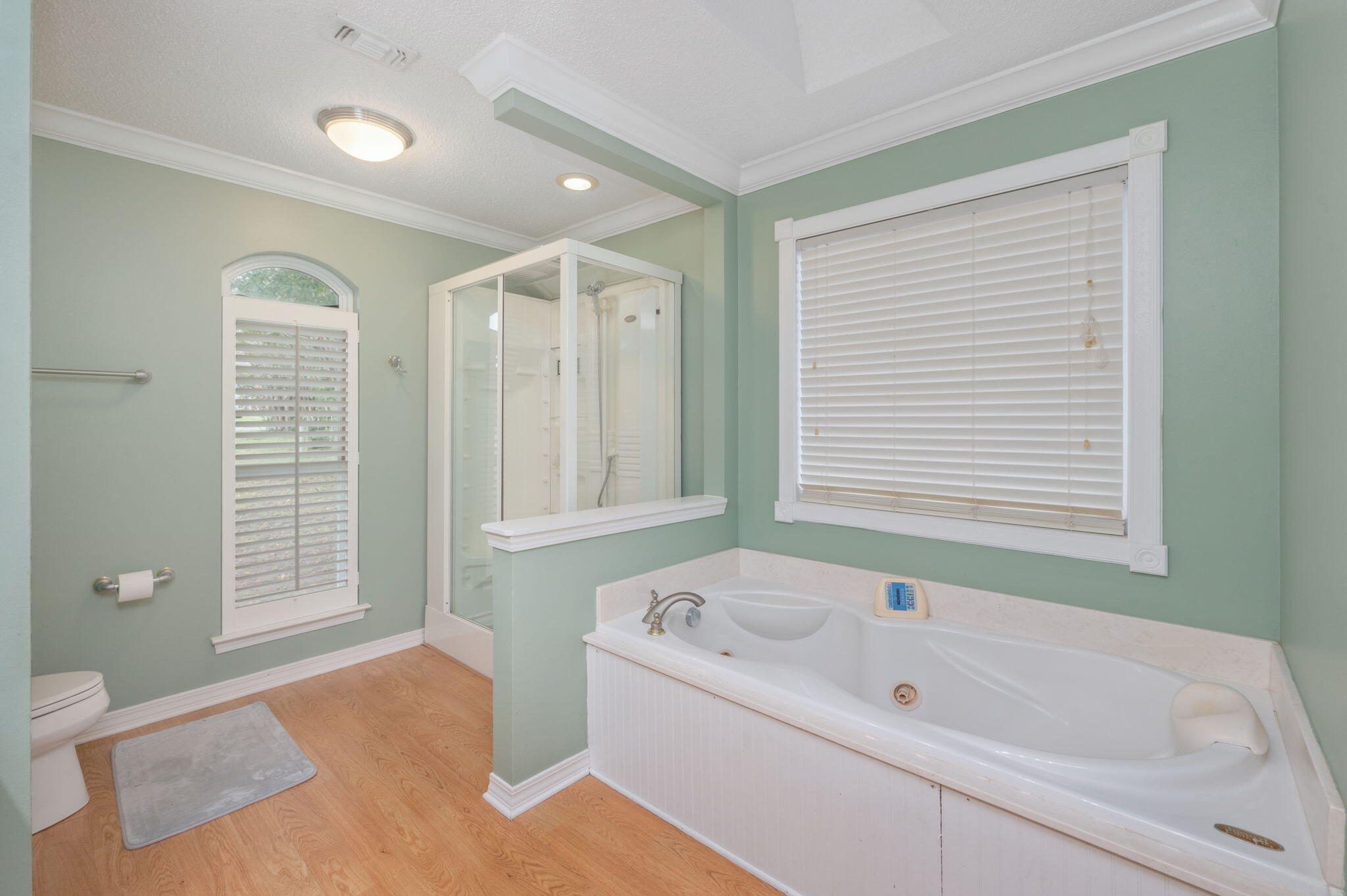 734 Riva Ridge Drive Crestview, FL 32539 - Photo 24 of 53 a bathroom with a bathtub and a shower