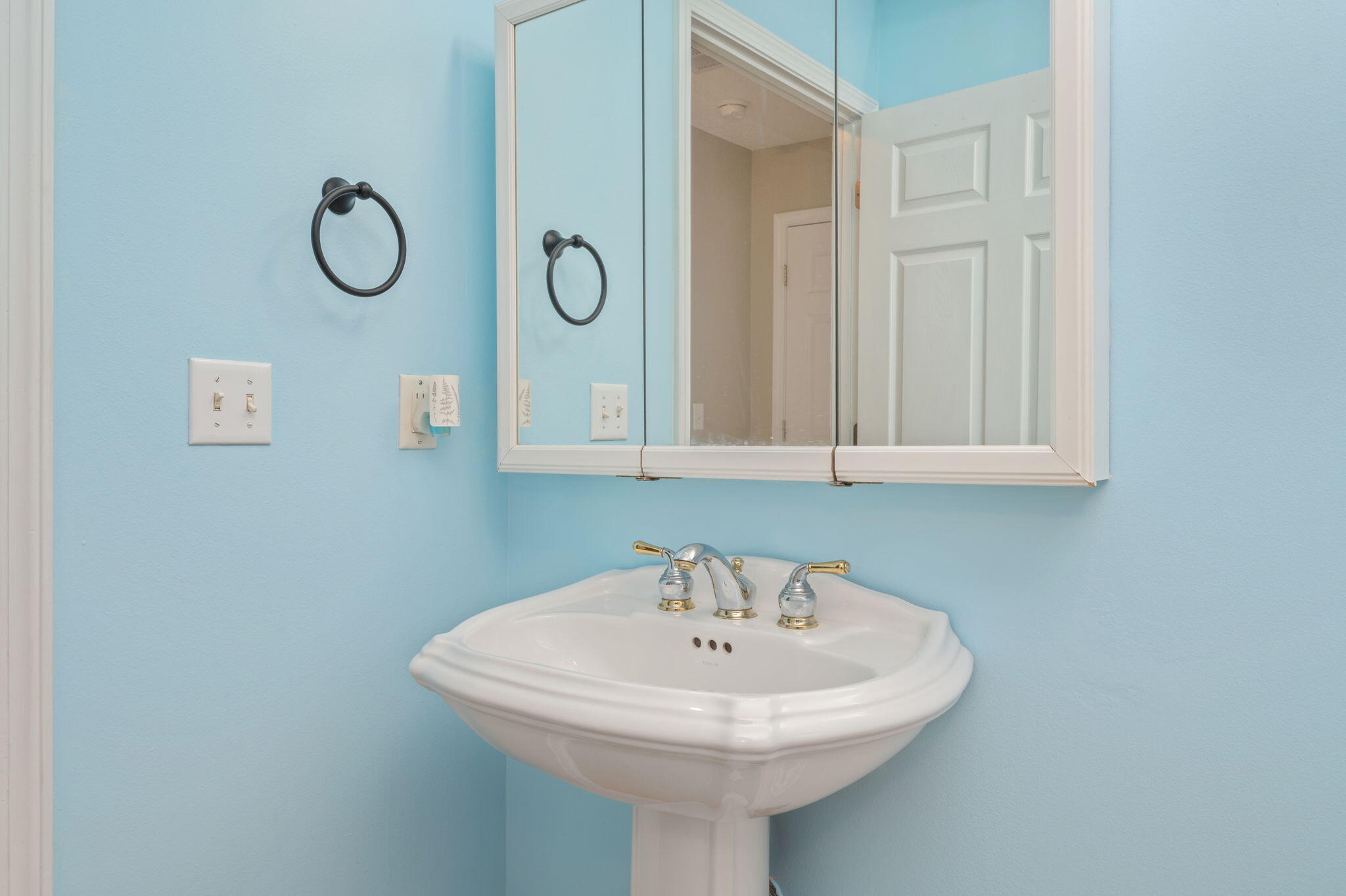 734 Riva Ridge Drive Crestview, FL 32539 - Photo 31 of 53 a bathroom with a sink and a mirror