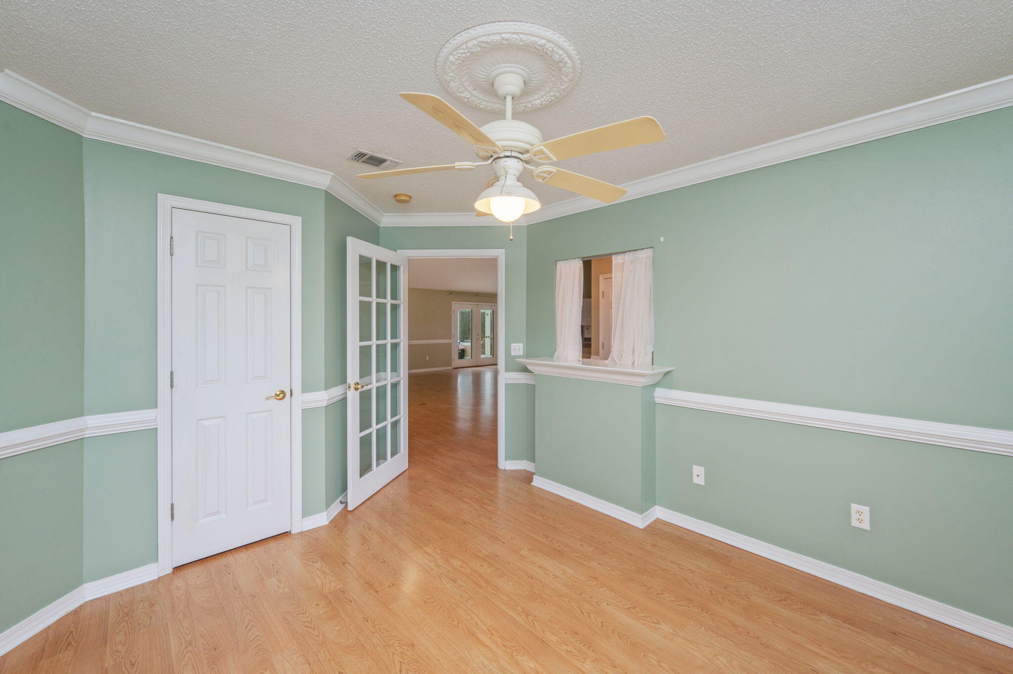 734 Riva Ridge Drive Crestview, FL 32539 - Photo 36 of 53 a view of empty room with window and ceiling fan