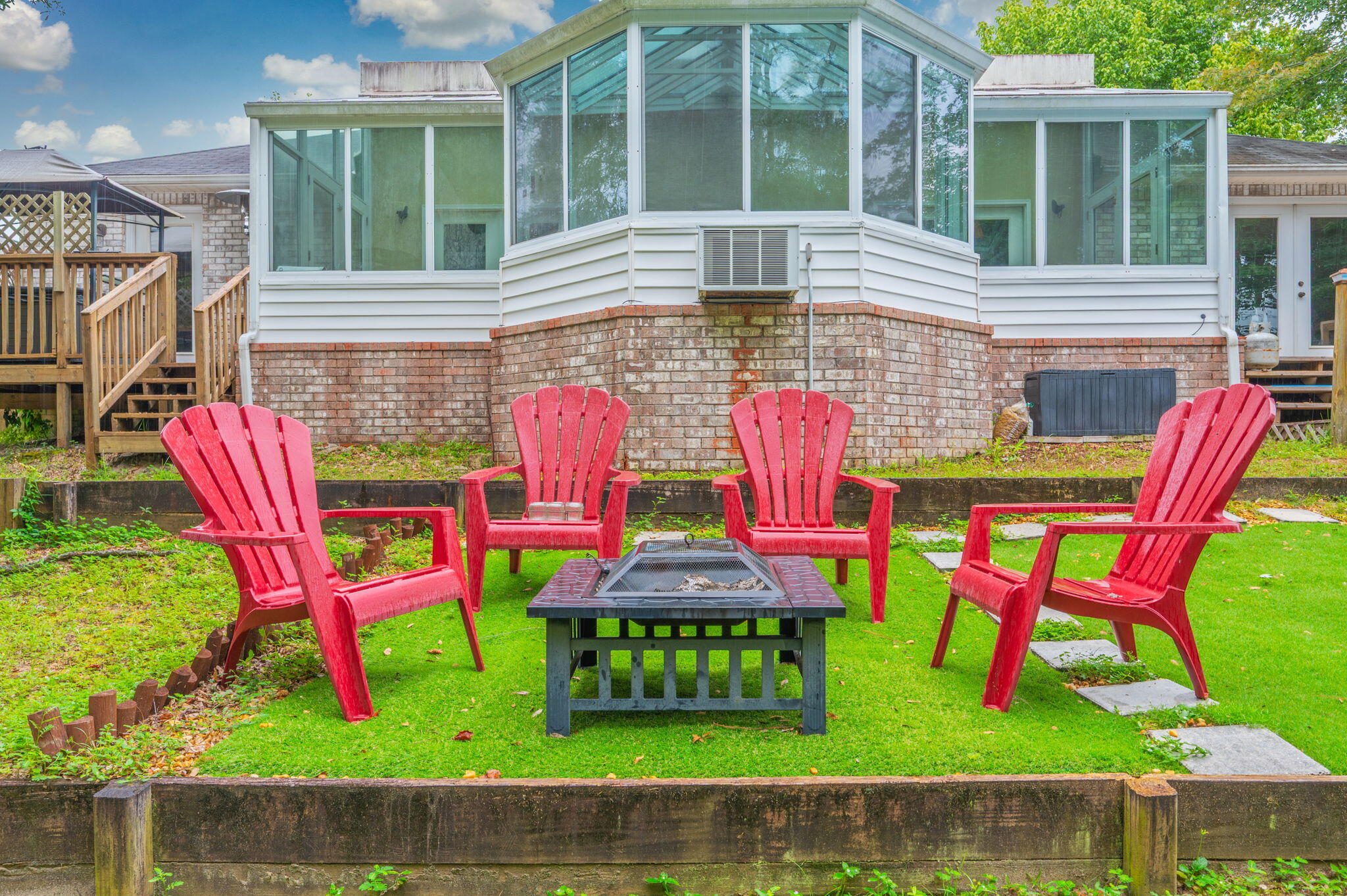 734 Riva Ridge Drive Crestview, FL 32539 - Photo 50 of 53 a backyard of a house with outdoor seating