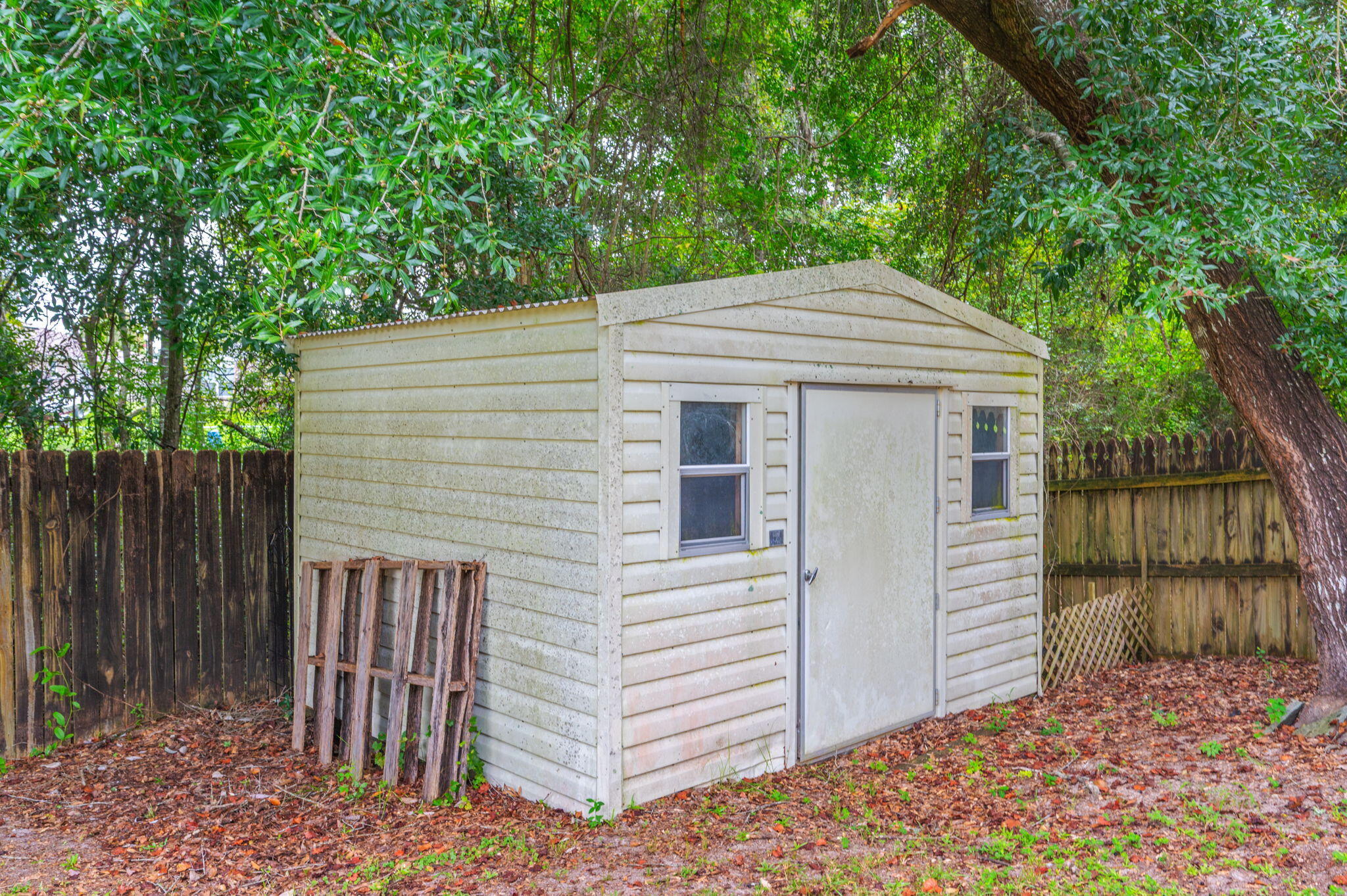 734 Riva Ridge Drive Crestview, FL 32539 - Photo 53 of 53 a front view of a house with a garden