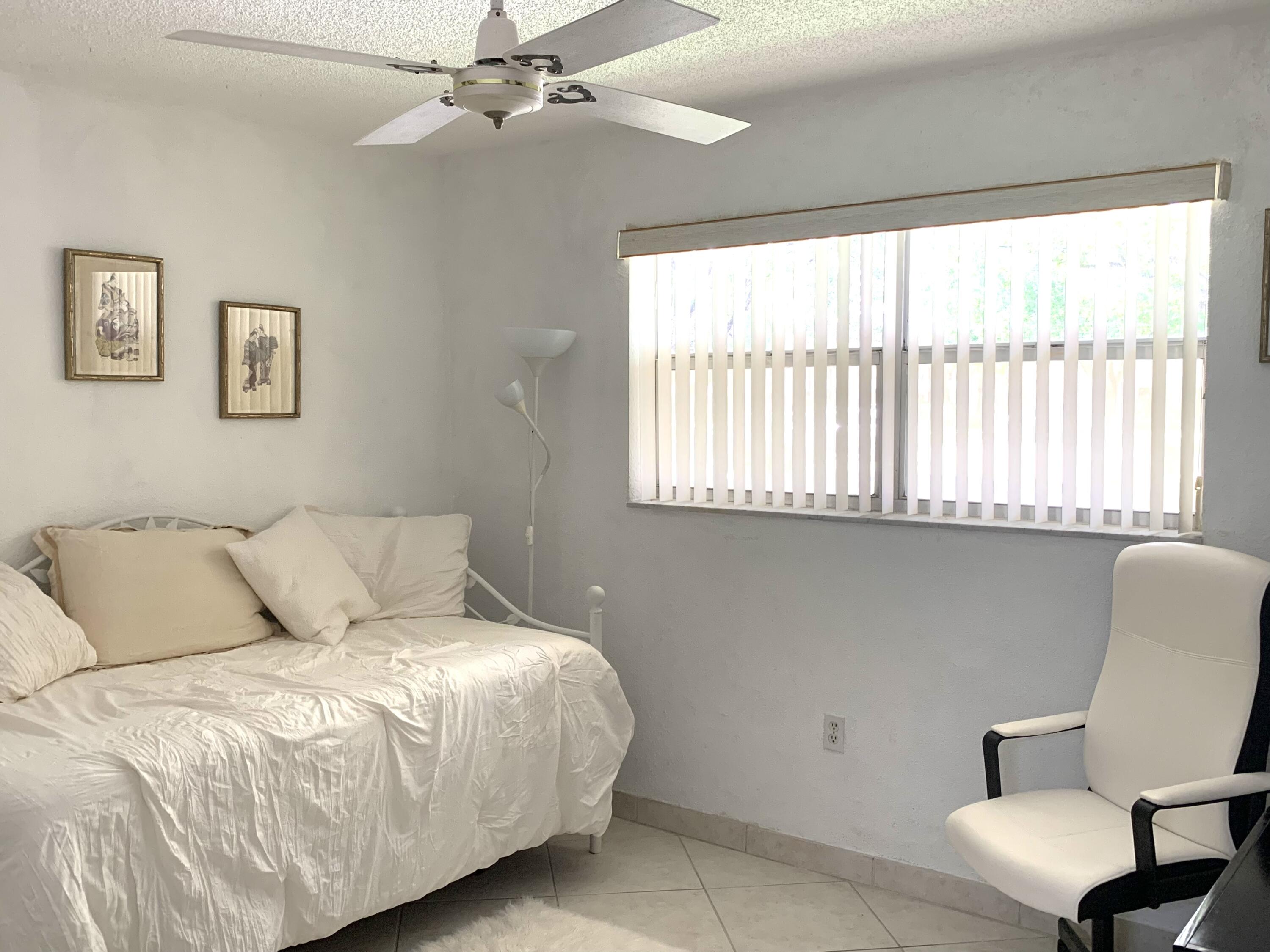 2801 North Pine Island Road, Unit 110 Sunrise, FL 33322 - Photo 13 of 26 IMG_2901 bedroom 2