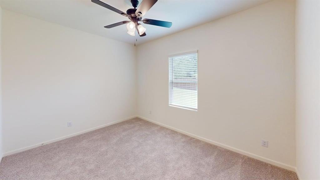 4529 Winecup Road Melissa, TX 75454 - Photo 17 of 29 Room featuring light-colored walls and plush carpet flooring