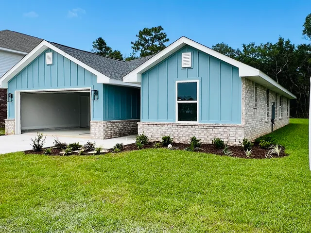 a front view of house with yard