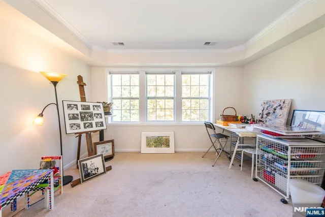 a workspace with furniture and a window