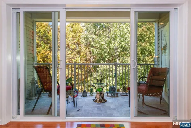a view of living room filled with furniture
