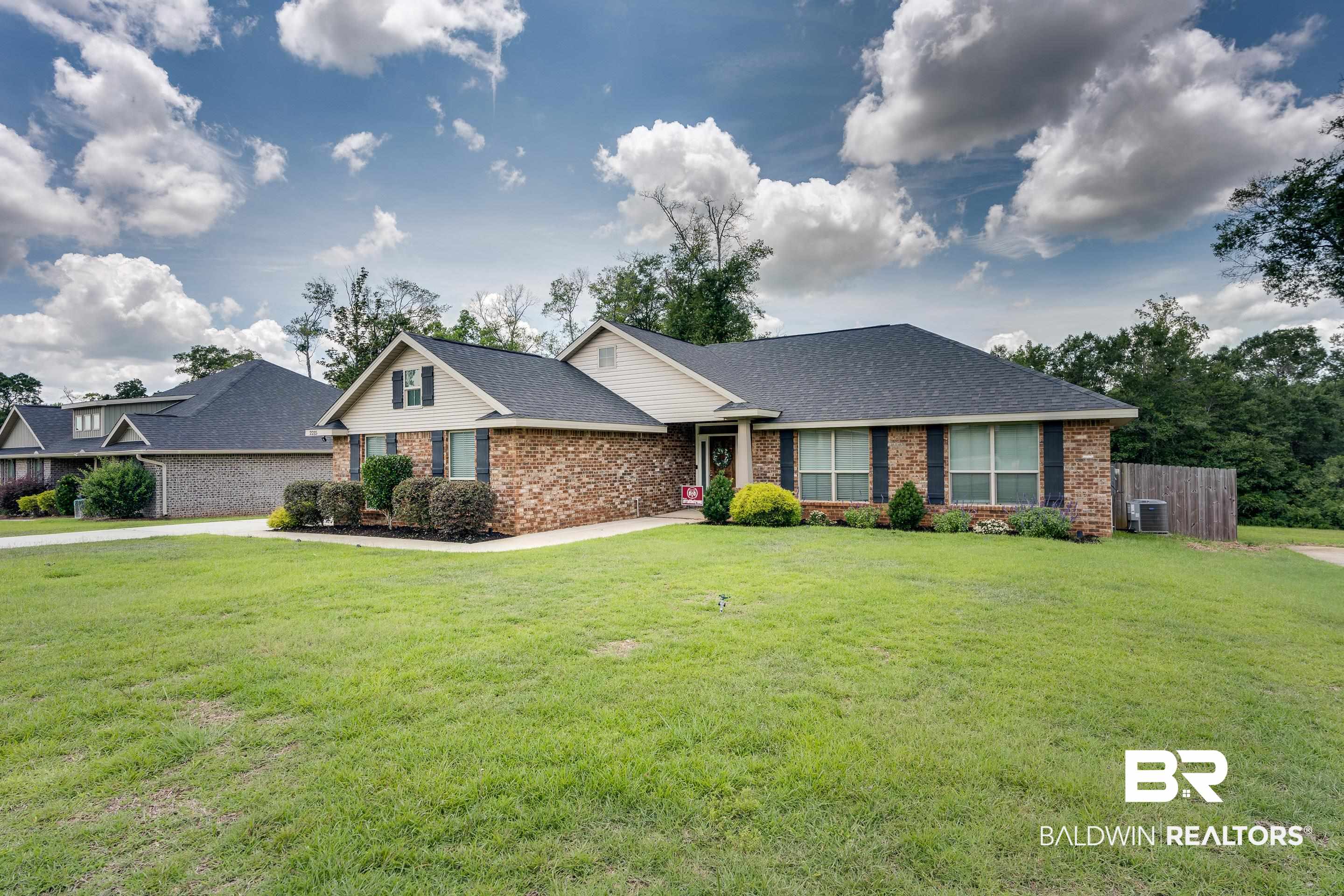 2215 Fernwood Loop West Semmes, AL 36575 - Photo 33 of 40 Traditional single-story residence with a brick and siding exterior