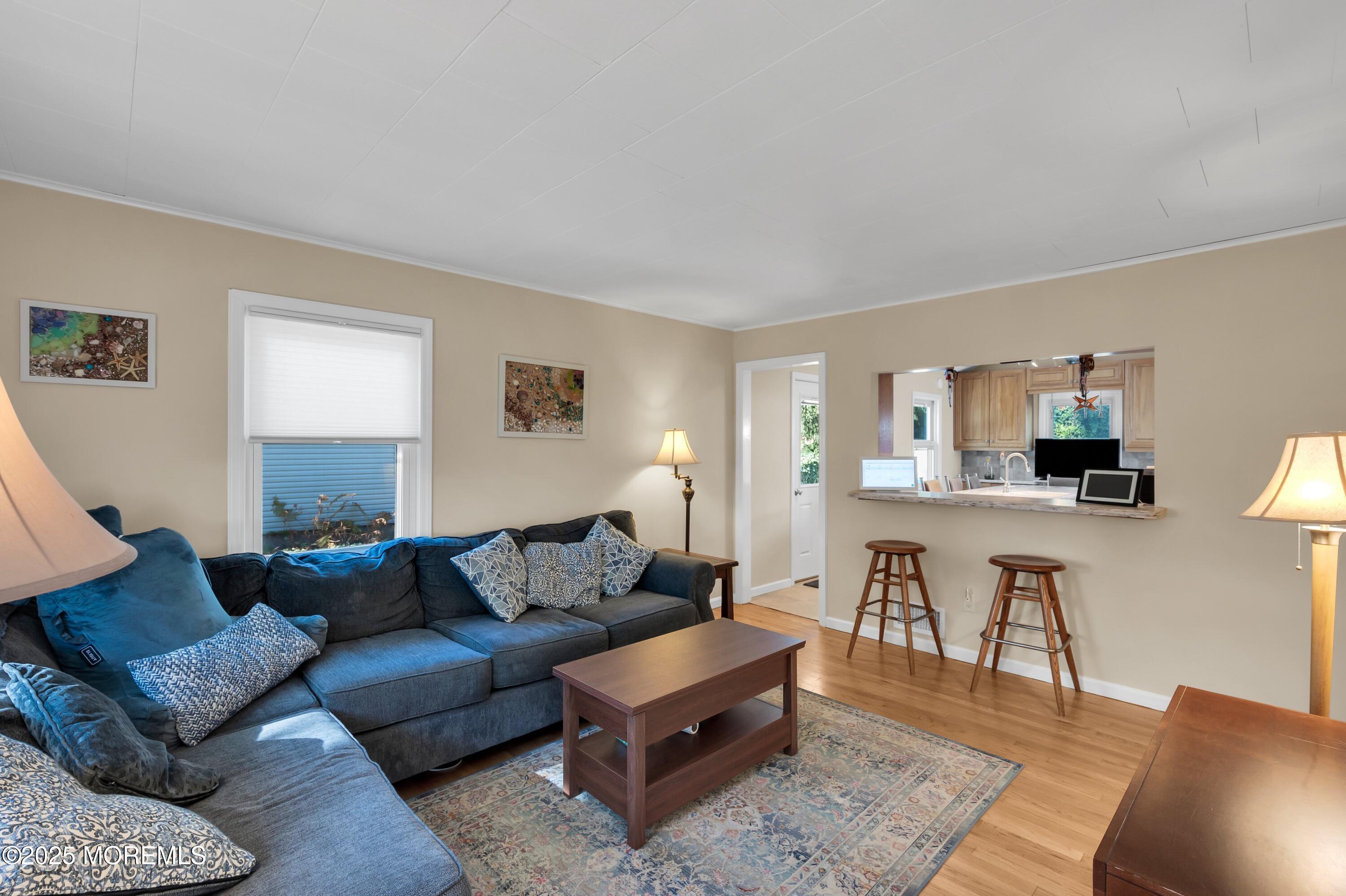 15 Hillside Street Red Bank, NJ 07701 - Photo 2 of 39 a living room with furniture and a wooden floor
