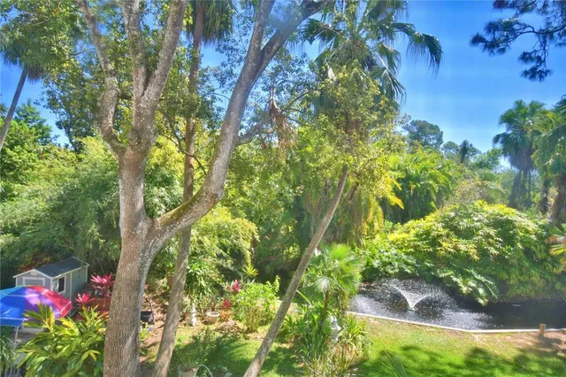 a backyard of a house with lots of green space