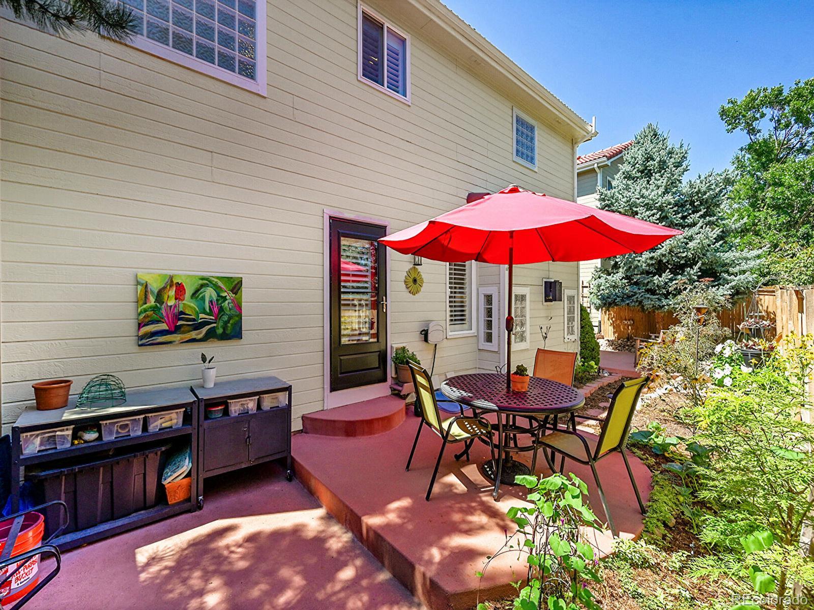 1221 Braewood Avenue Highlands Ranch, CO 80129 - Photo 32 of 45 swimming pool with outdoor seating and wooden floor