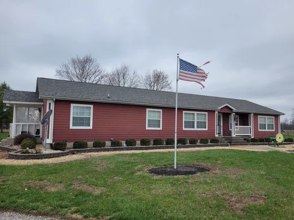 a house view with a garden space