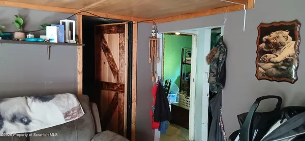 a bed room with a bed and a window