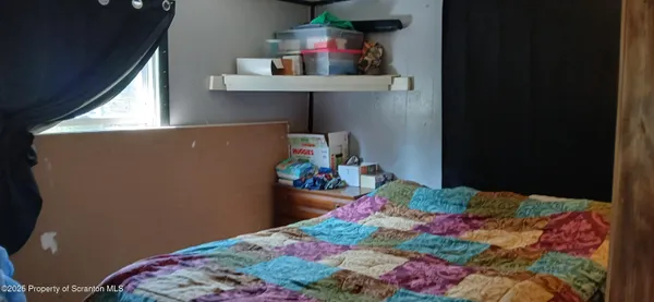 a view of a storage and utility room