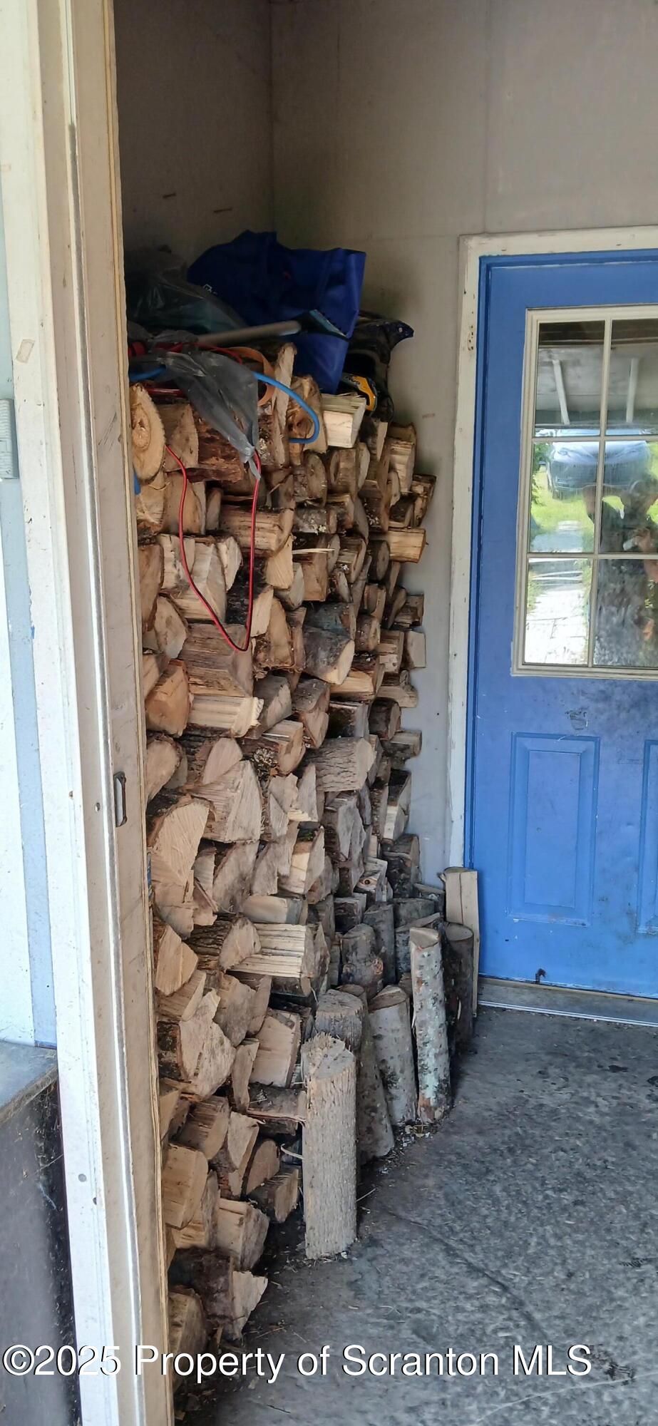4530 Oak Hill Road Susquehanna, PA 18847 - Photo 30 of 40 a bathroom with a toilet and a shower curtain