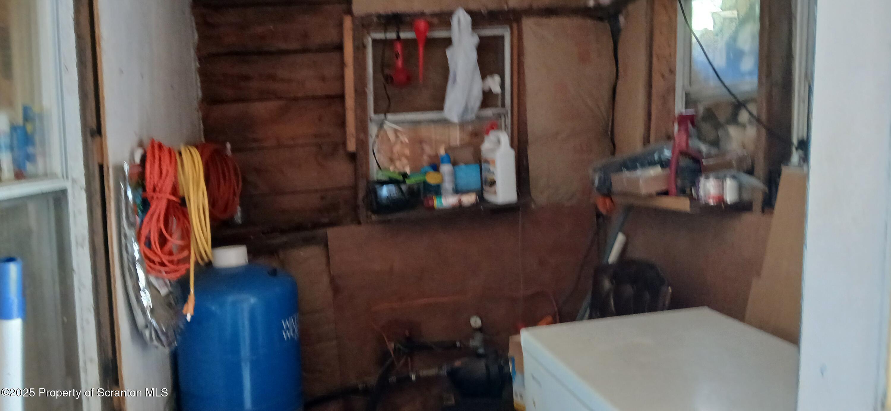 4530 Oak Hill Road Susquehanna, PA 18847 - Photo 32 of 40 a view of walk in closet with clothes and shoes