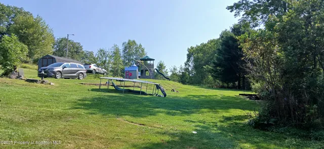 a garden view with a seating space
