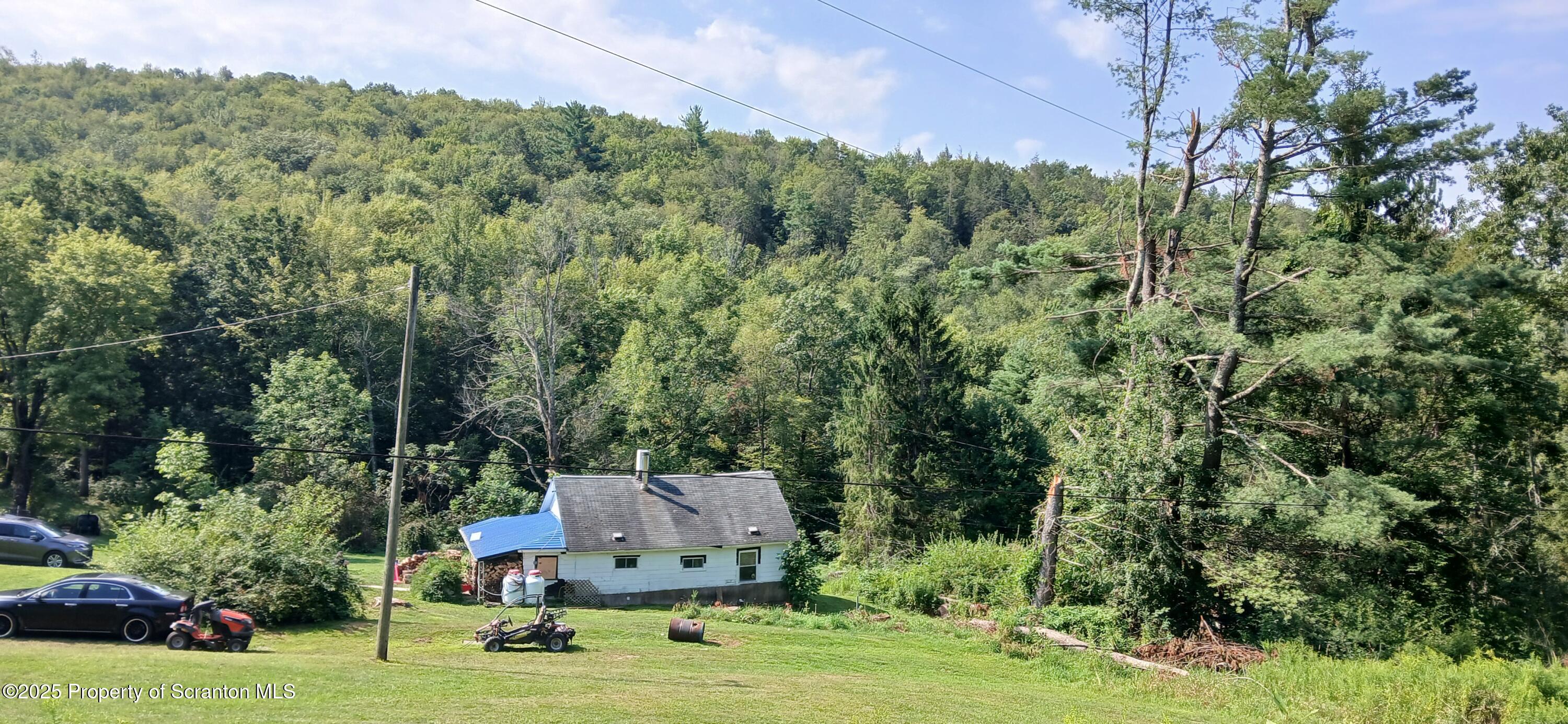 4530 Oak Hill Road Susquehanna, PA 18847 - Photo 10 of 40 a garden view with a seating space