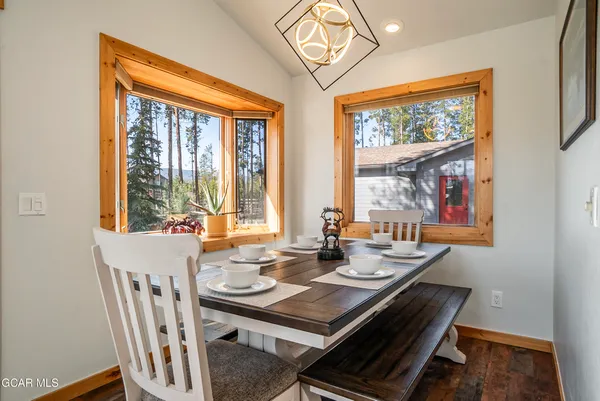 a room with furniture and a large window