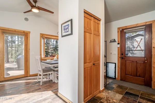 a view of living room kitchen with furniture and floor to ceiling window