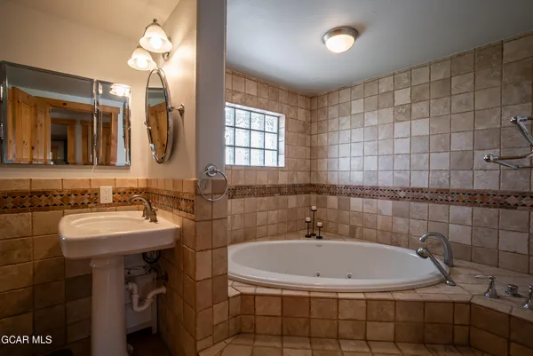 a living room with furniture and windows