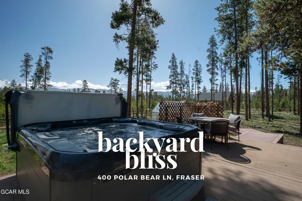 a view of a backyard of a house