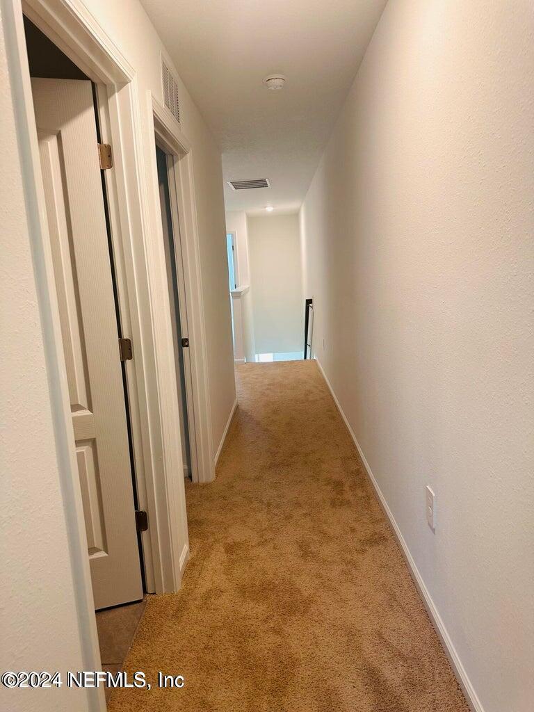101 Tidal Bch Avenue St. Augustine, FL 32095 - Photo 4 of 13 a view of a hallway