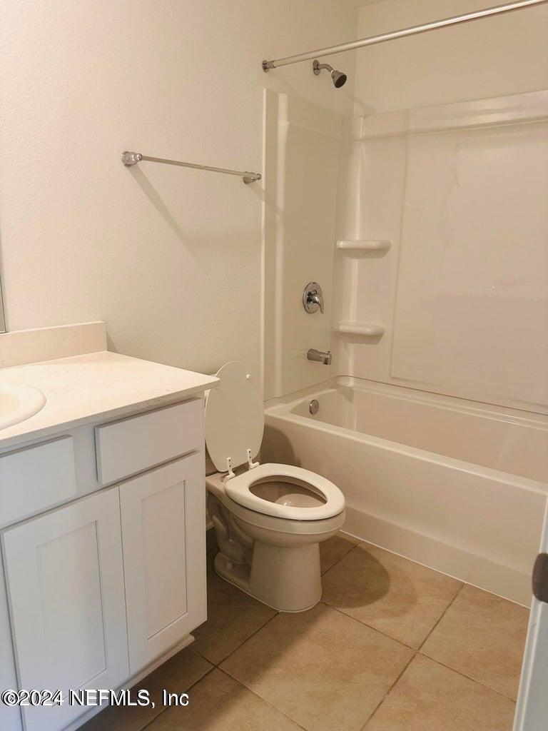 101 Tidal Bch Avenue St. Augustine, FL 32095 - Photo 7 of 13 a bathroom with a sink toilet and shower