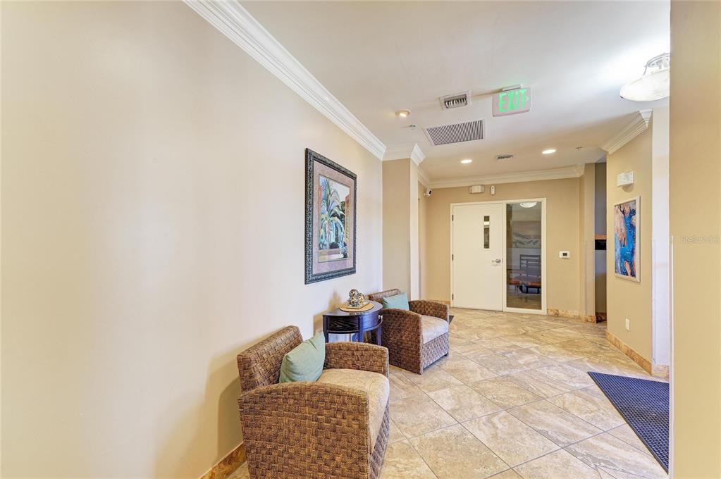 3191 Matecumbe Key Road, Unit 307 Punta Gorda, FL 33955 - Photo 29 of 40 a living room with furniture and a window