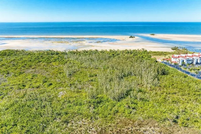 a view of a room with floor to ceiling window and mountain view