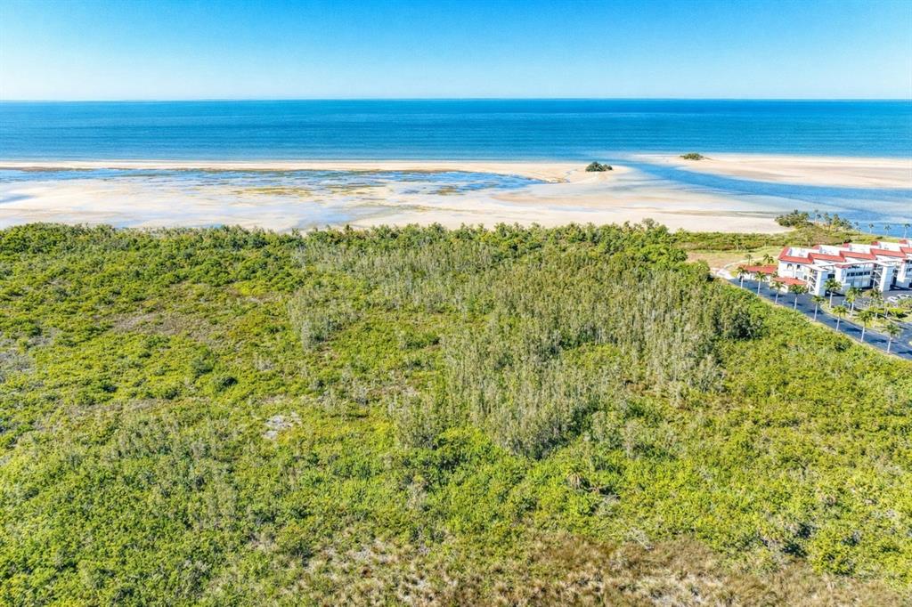 3191 Matecumbe Key Road, Unit 307 Punta Gorda, FL 33955 - Photo 4 of 40 a view of a room with floor to ceiling window and mountain view