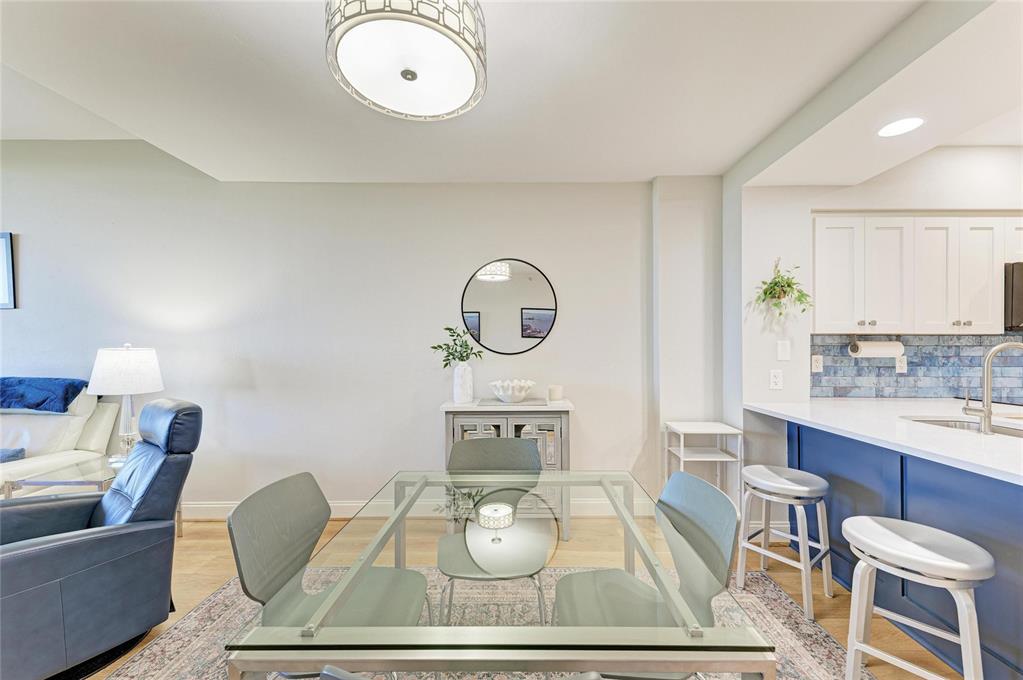 3191 Matecumbe Key Road, Unit 307 Punta Gorda, FL 33955 - Photo 9 of 40 a living room with furniture and a wooden floor