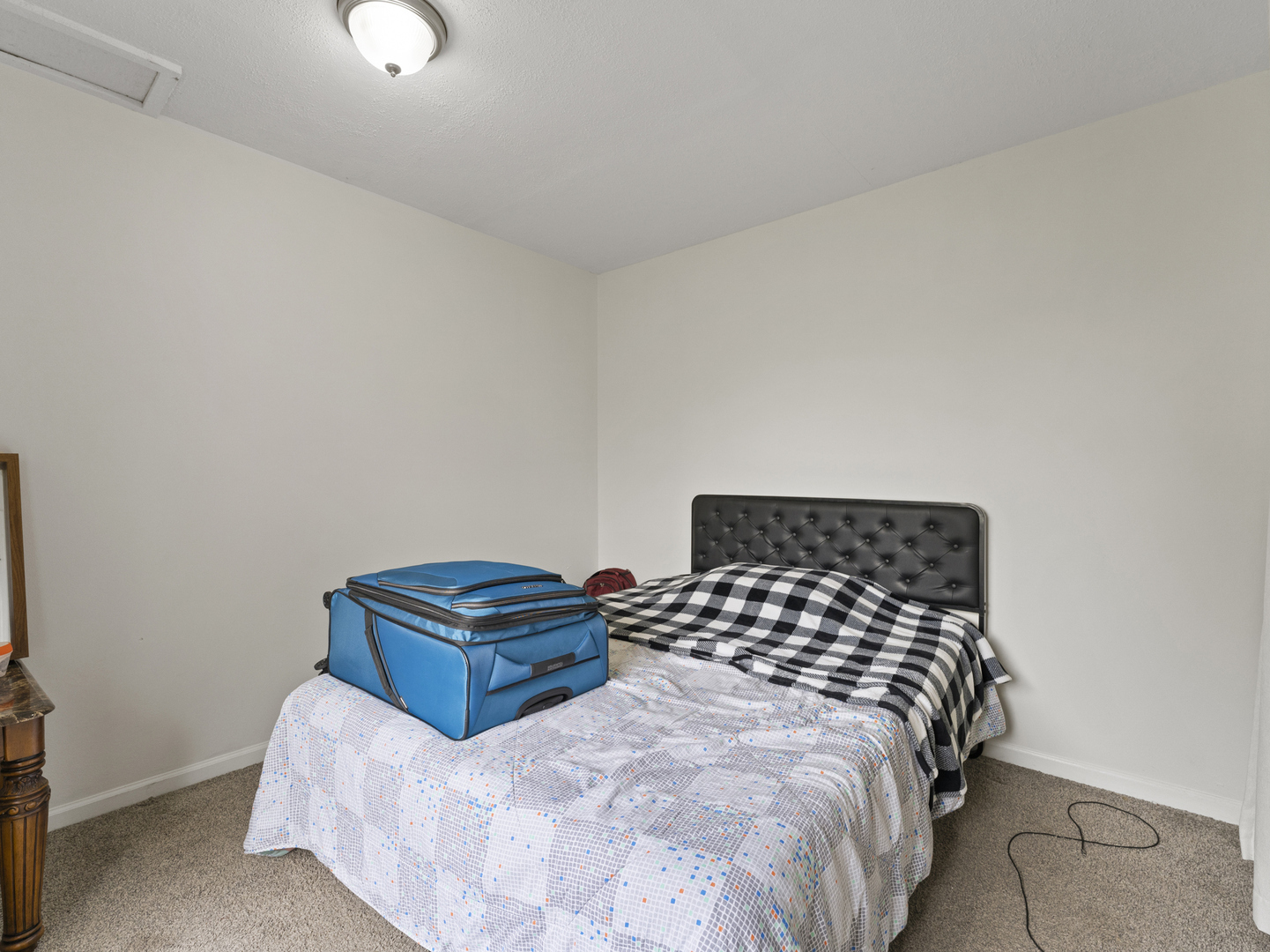 741 Colby Court Gurnee, IL 60031 - Photo 12 of 16 a bedroom with a bed and window