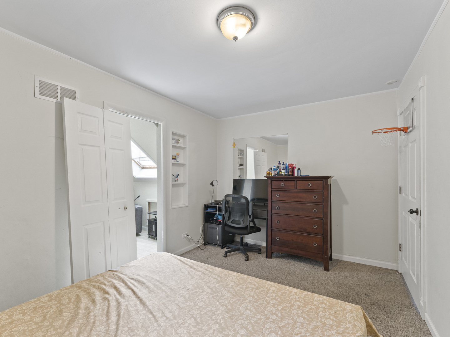 741 Colby Court Gurnee, IL 60031 - Photo 15 of 16 a bedroom with a chair and gym equipment
