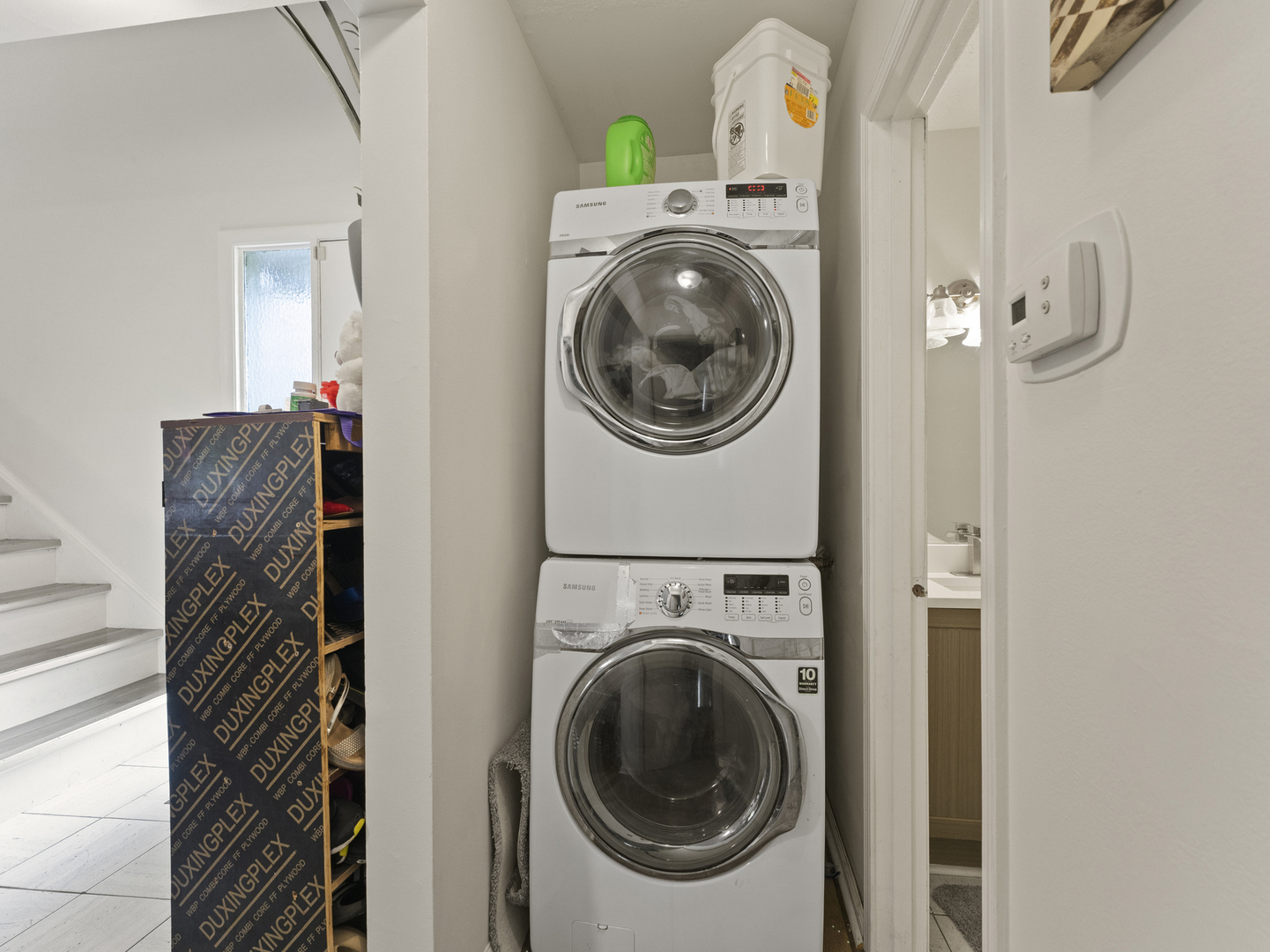 741 Colby Court Gurnee, IL 60031 - Photo 9 of 16 a view of a hallway with washer and dryer