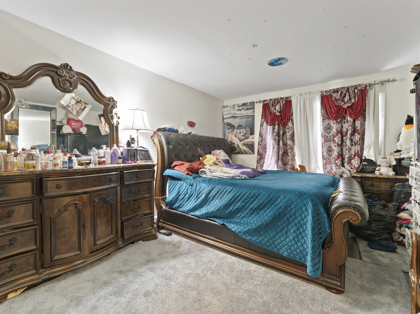 741 Colby Court Gurnee, IL 60031 - Photo 10 of 16 a bedroom with furniture and a bed